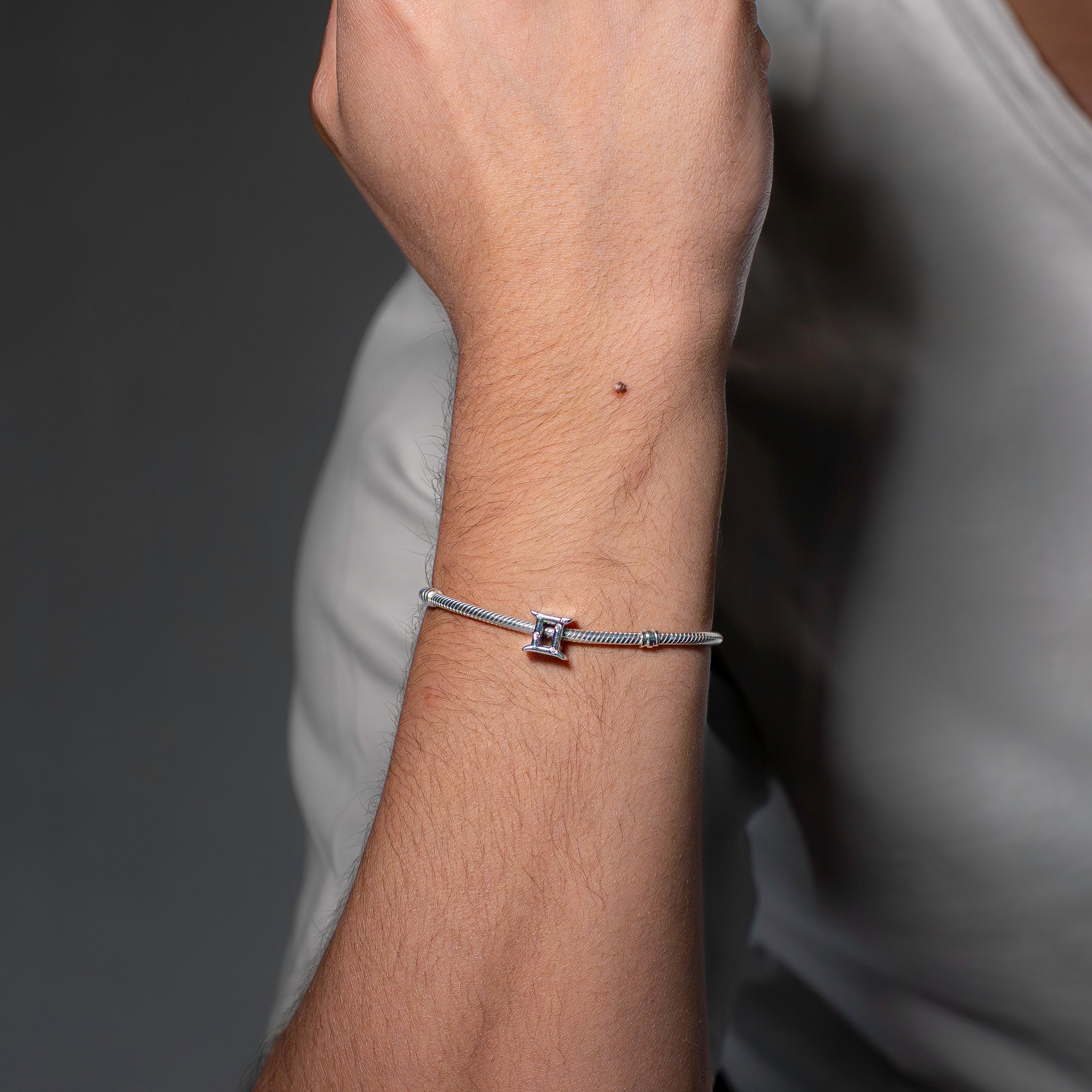 Gemini sterling silver charm with clear cubic zirconia