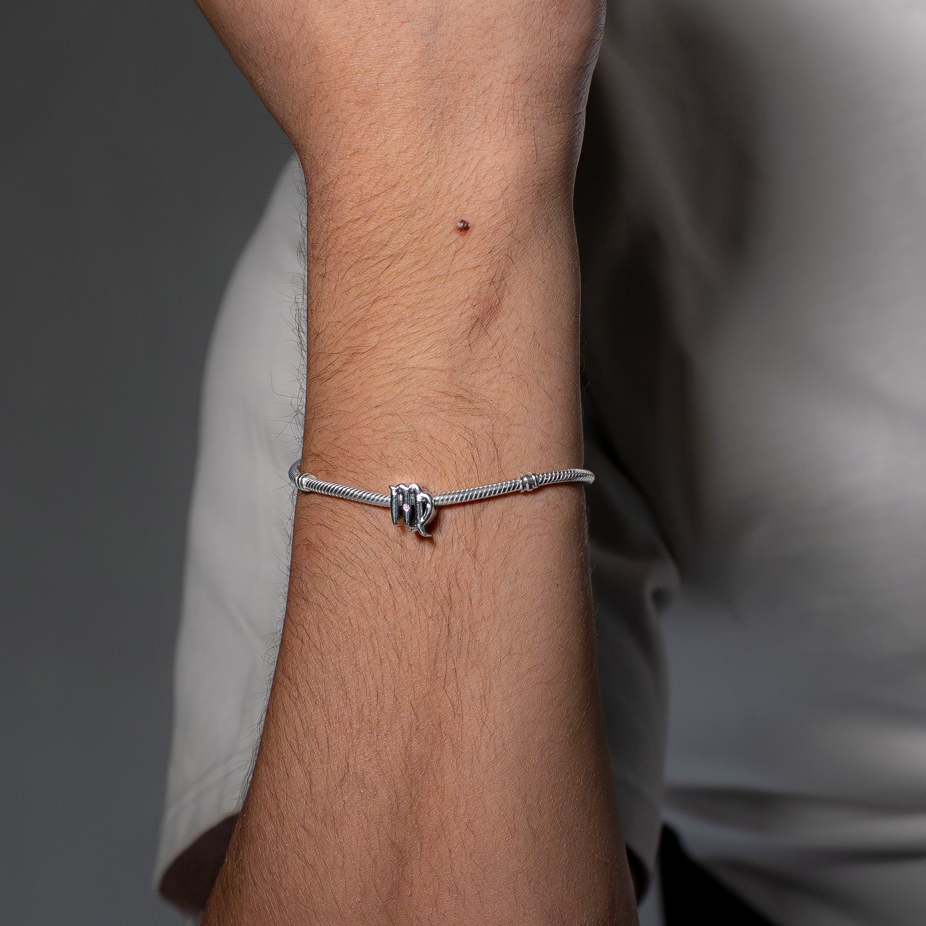 Virgo sterling silver charm with clear cubic zirconia