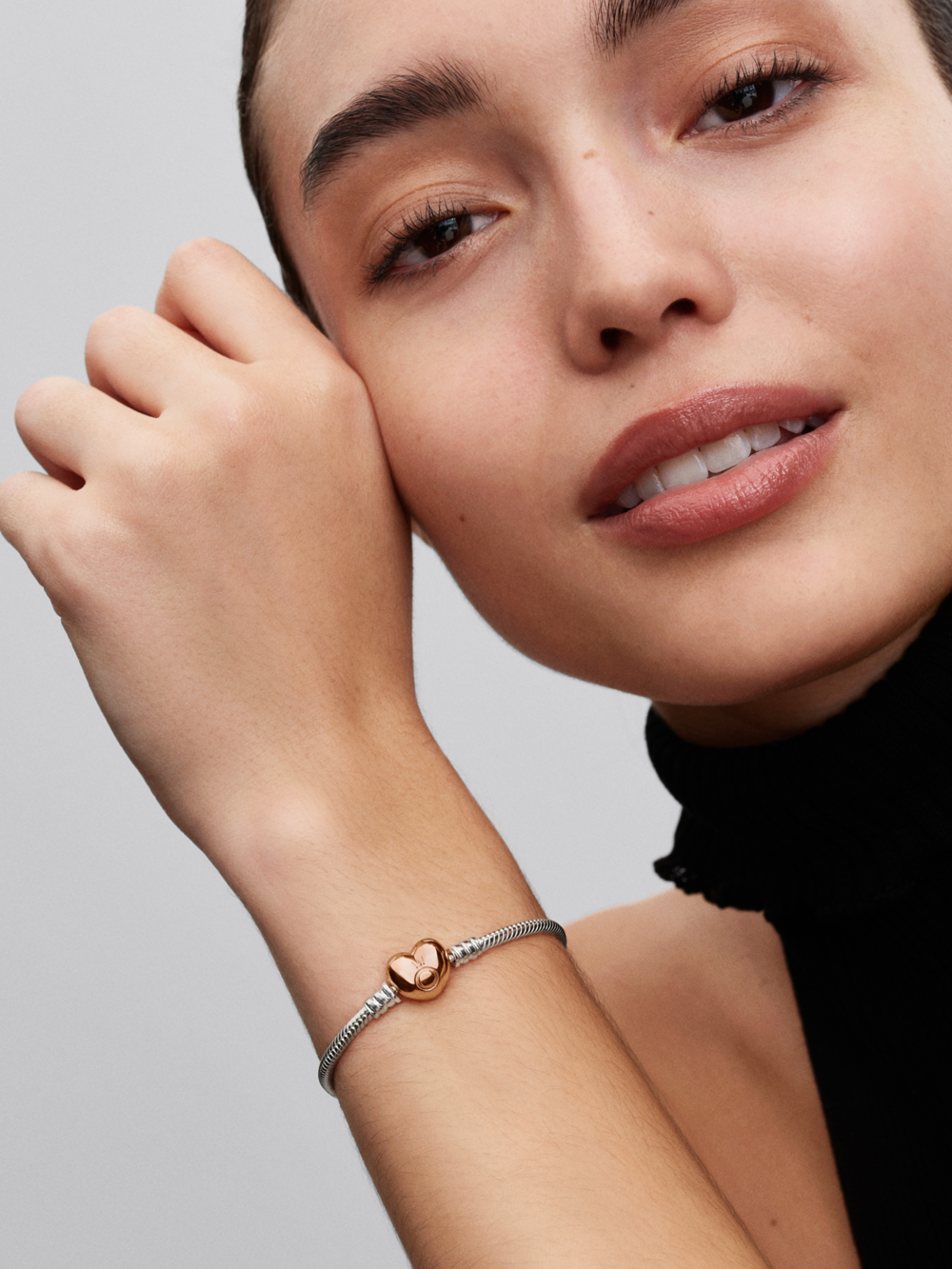 Silver bracelet with heart-shaped 14k Rose Gold-plated clasp