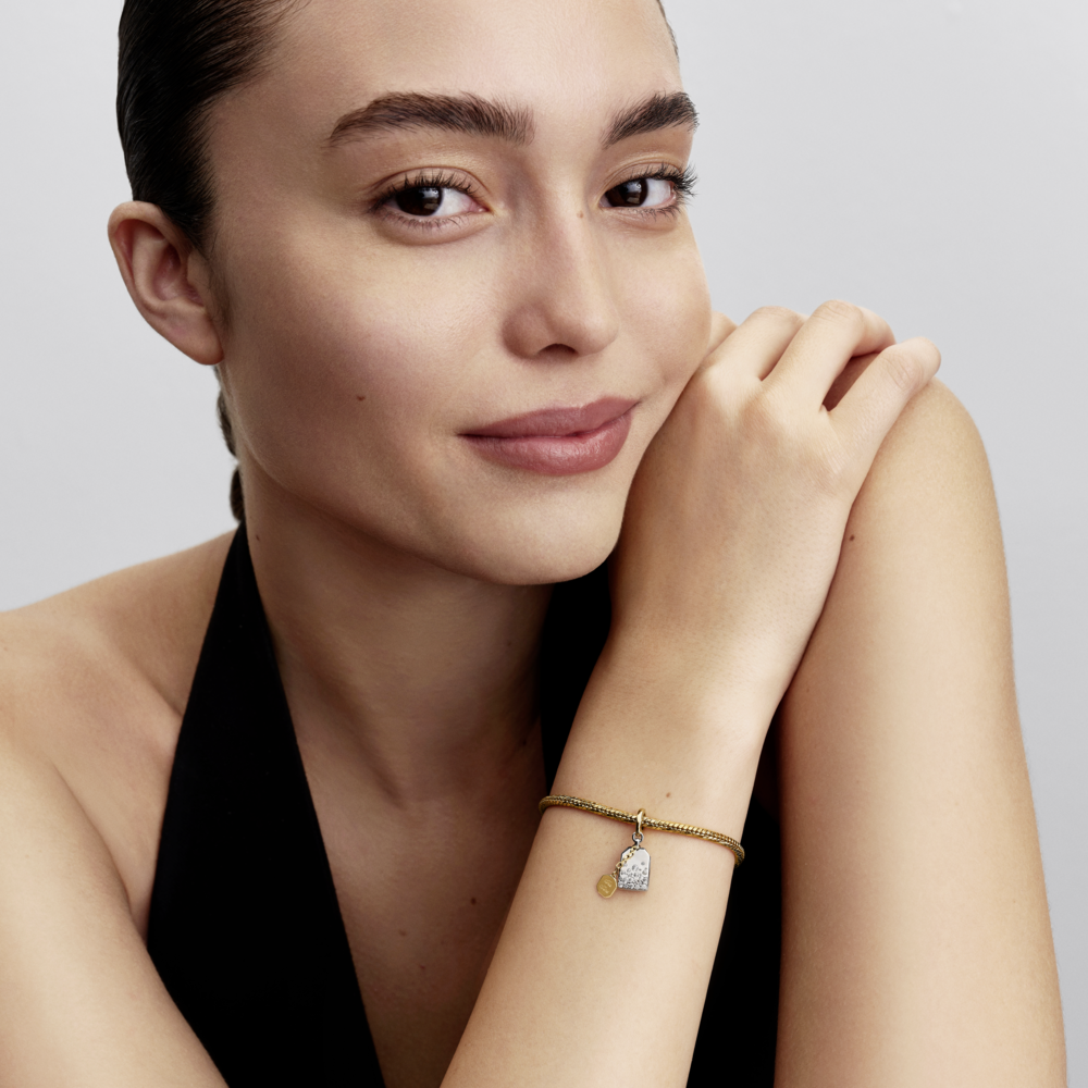 Tea bag sterling silver and 14k gold-plated dangle with clear cubic zirconia