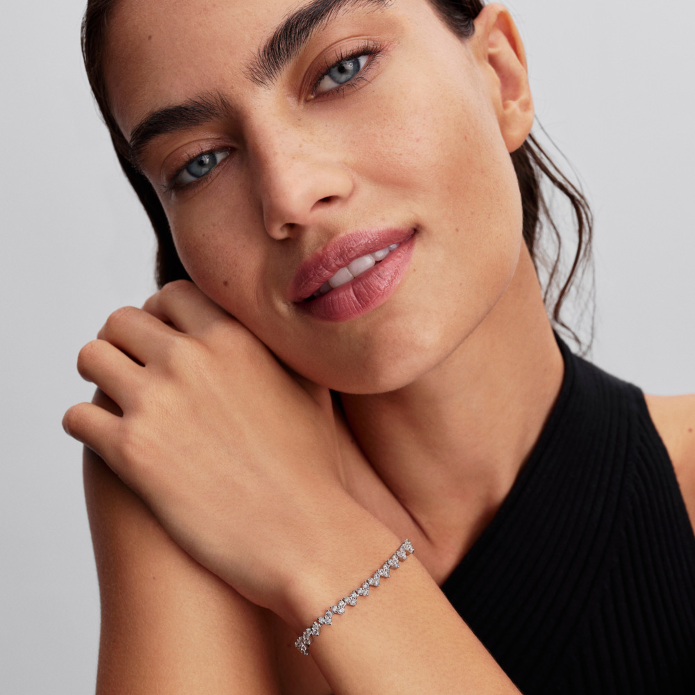 Heart sterling silver tennis bracelet with clear cubic zirconia