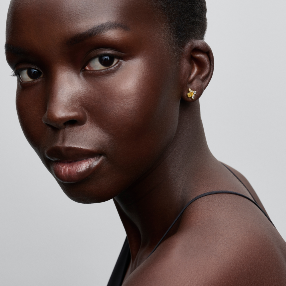 Bee 14k gold-plated stud earrings with vibrant yellow and clear cubic zirconia