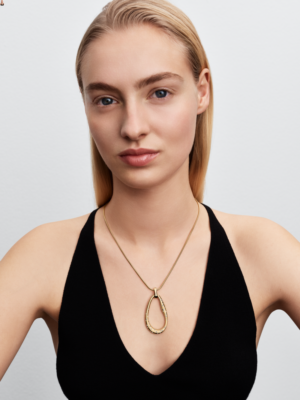 14k gold-plated pendant necklace with clear cubic zirconia and sliding clasp