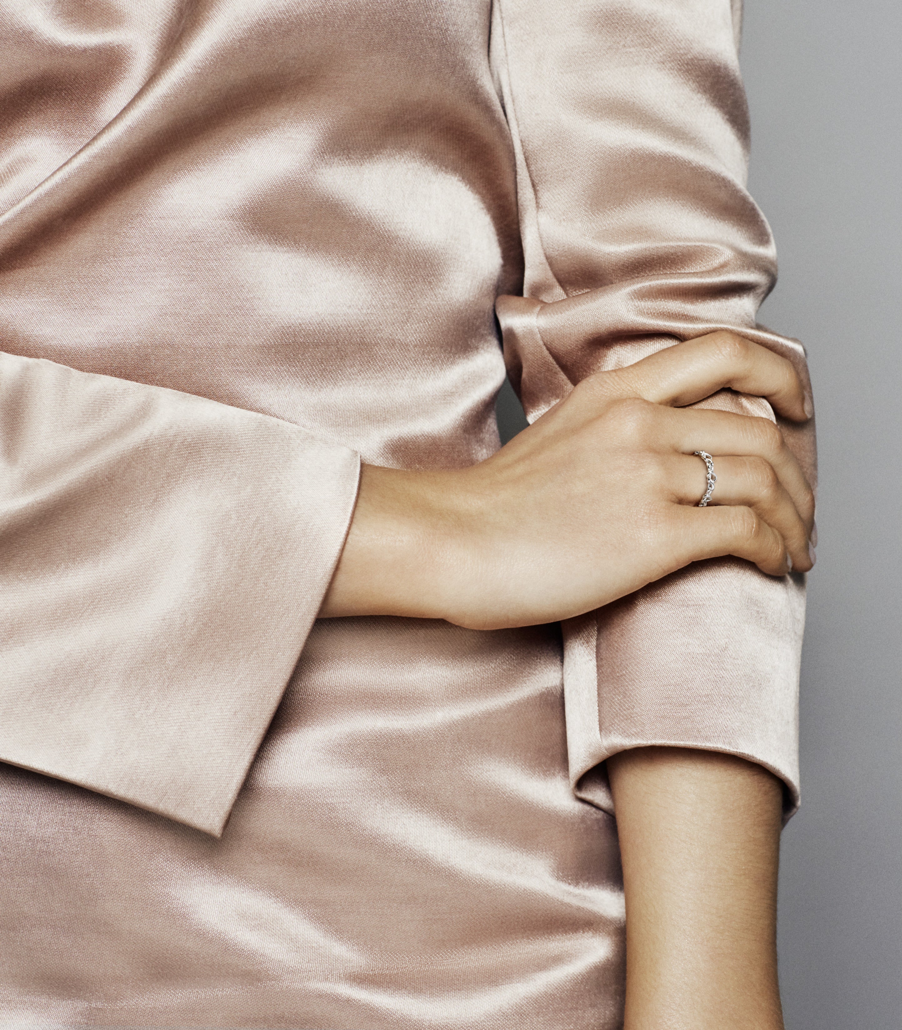 Knotted hearts silver ring