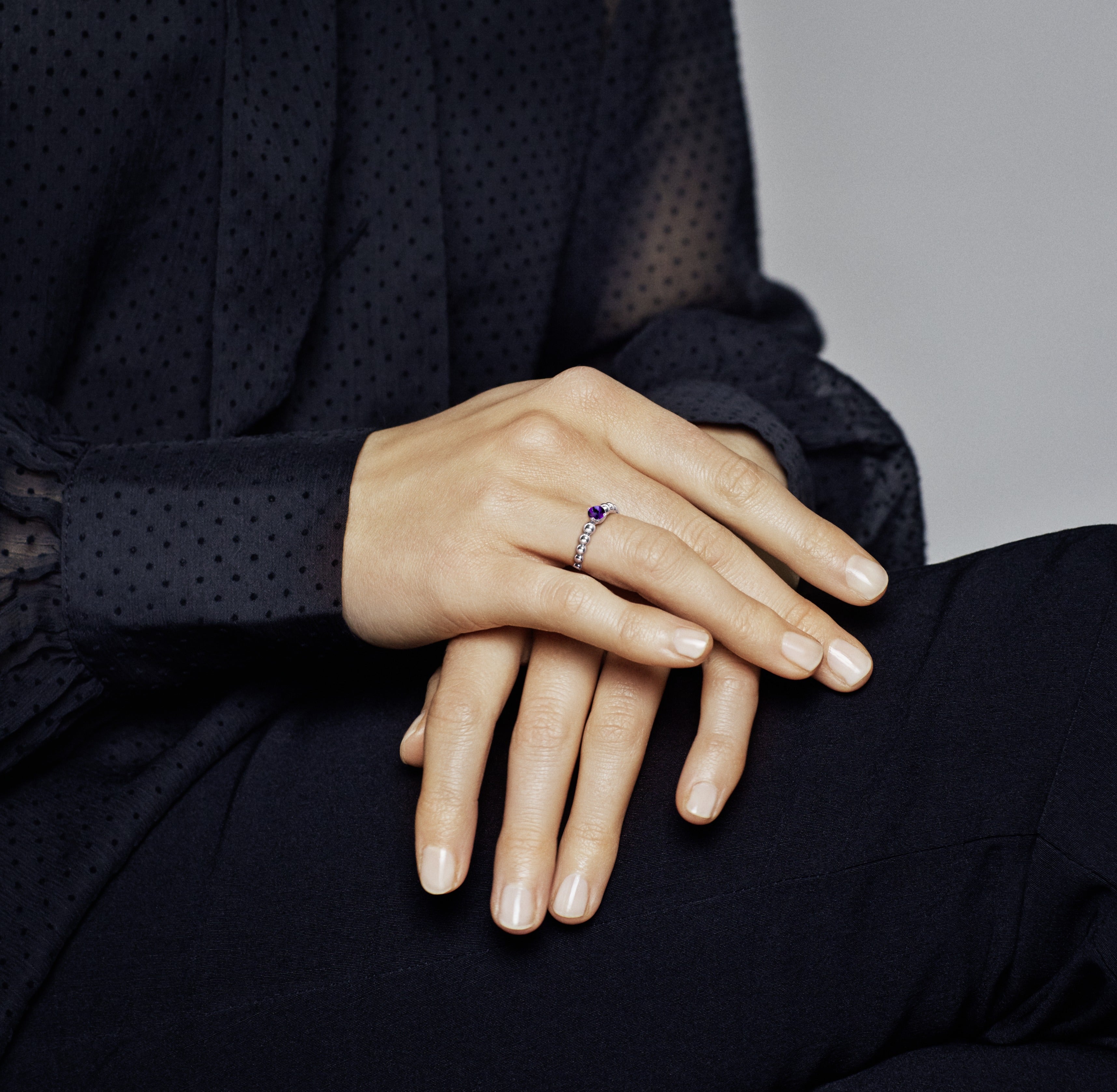 Sterling silver ring with treated purple topaz