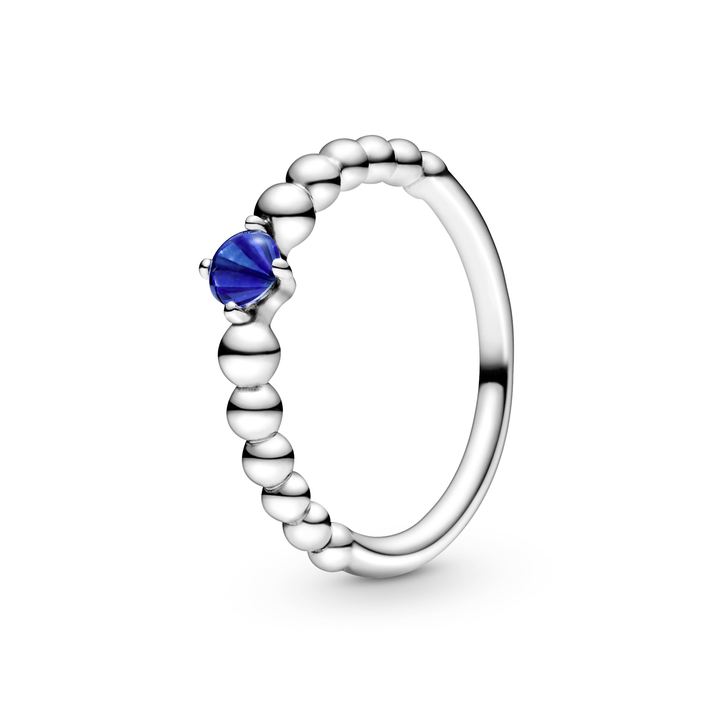 Sterling silver ring with treated sea blue topaz