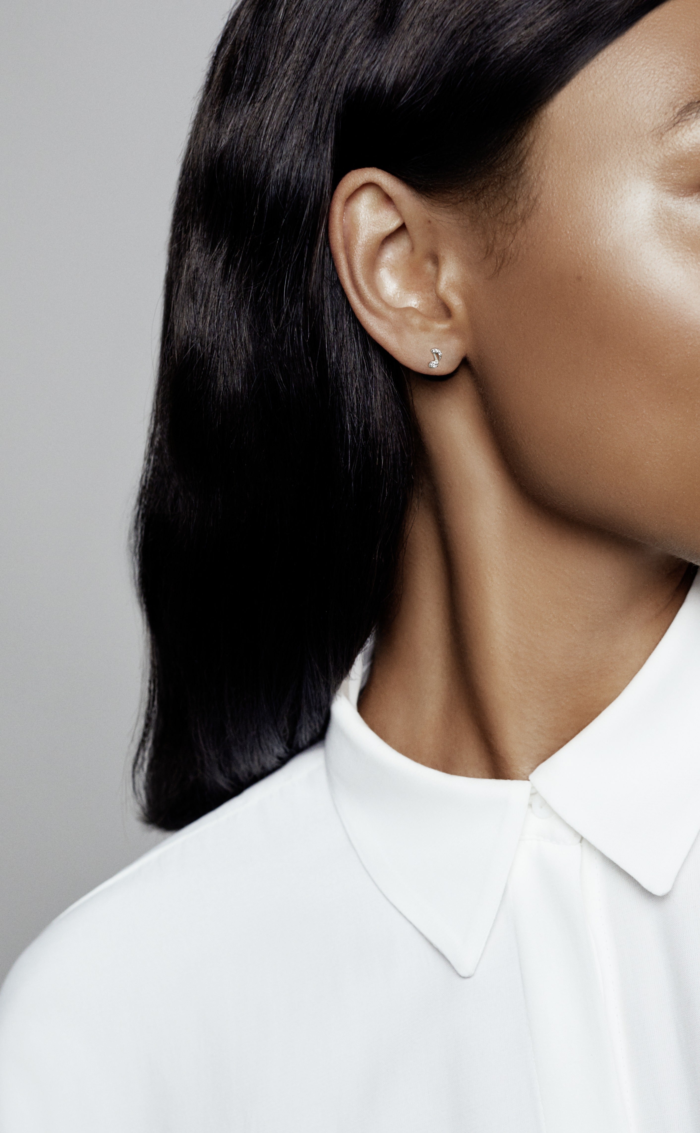 Musical note sterling silver stud earring with clear cubic zirconia