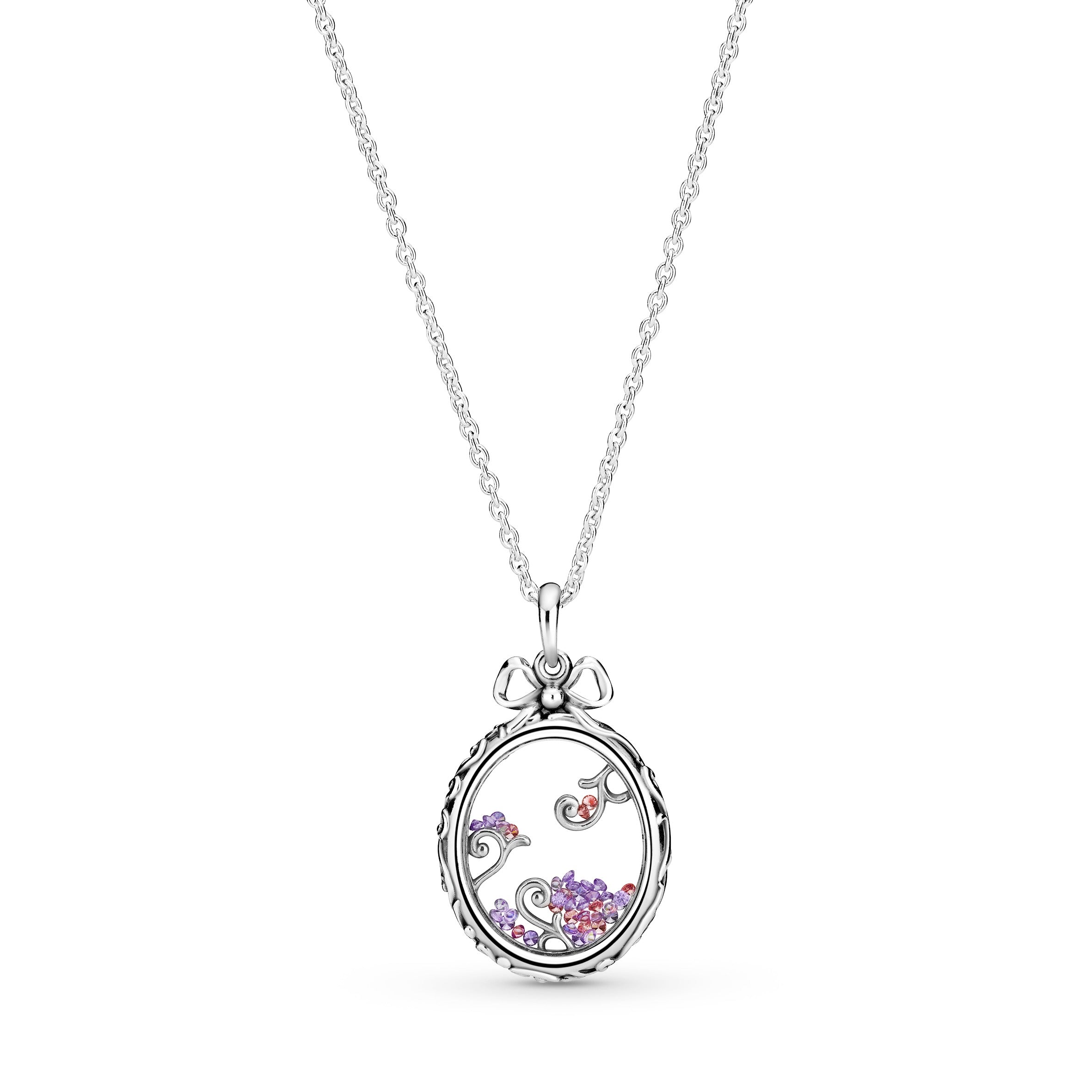 Regal pattern locket silver pendant with fancy pink, fancy purple and purple cubic zirconia
