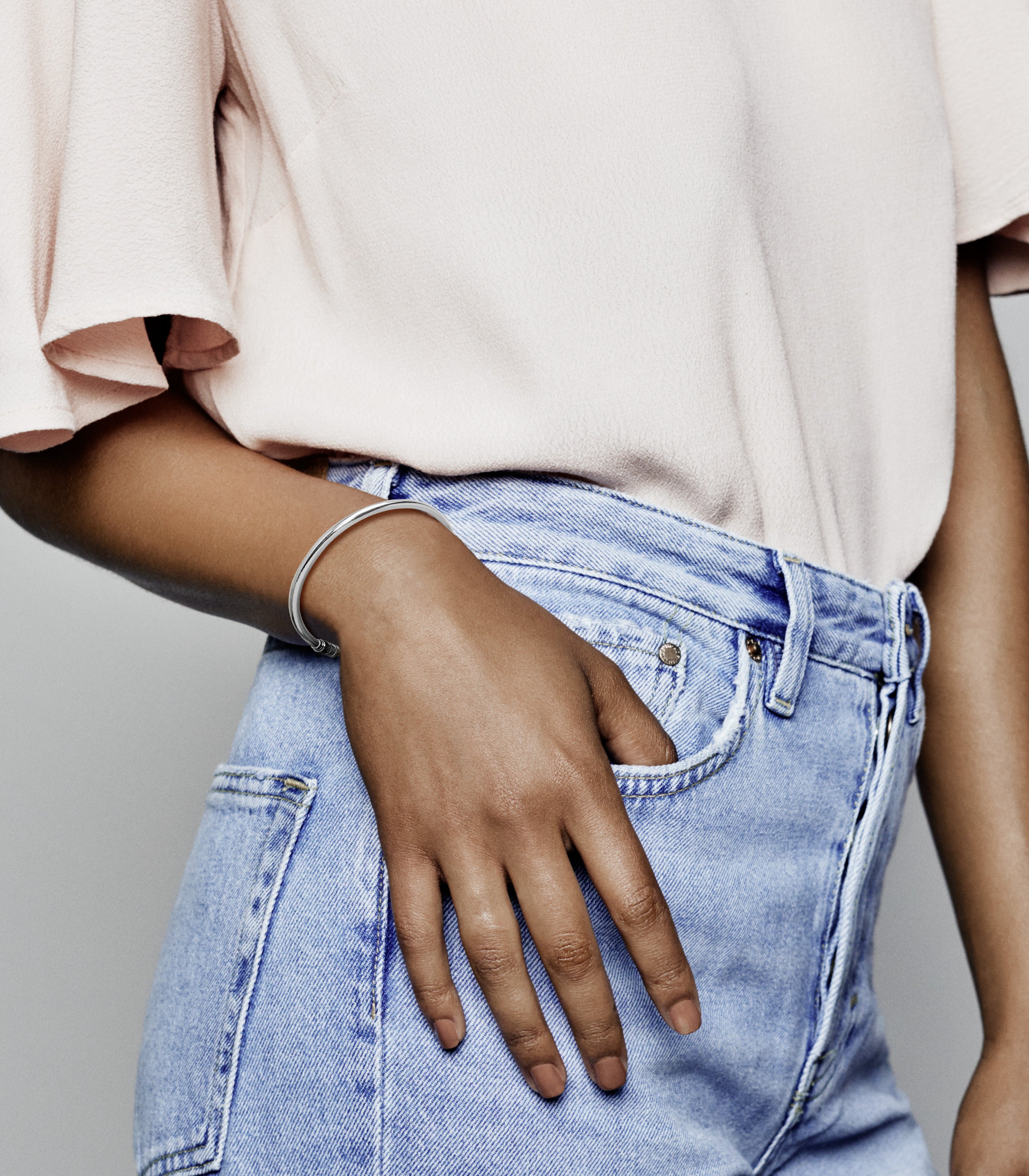 Silver bangle with clear cubic zirconia and sliding clasp