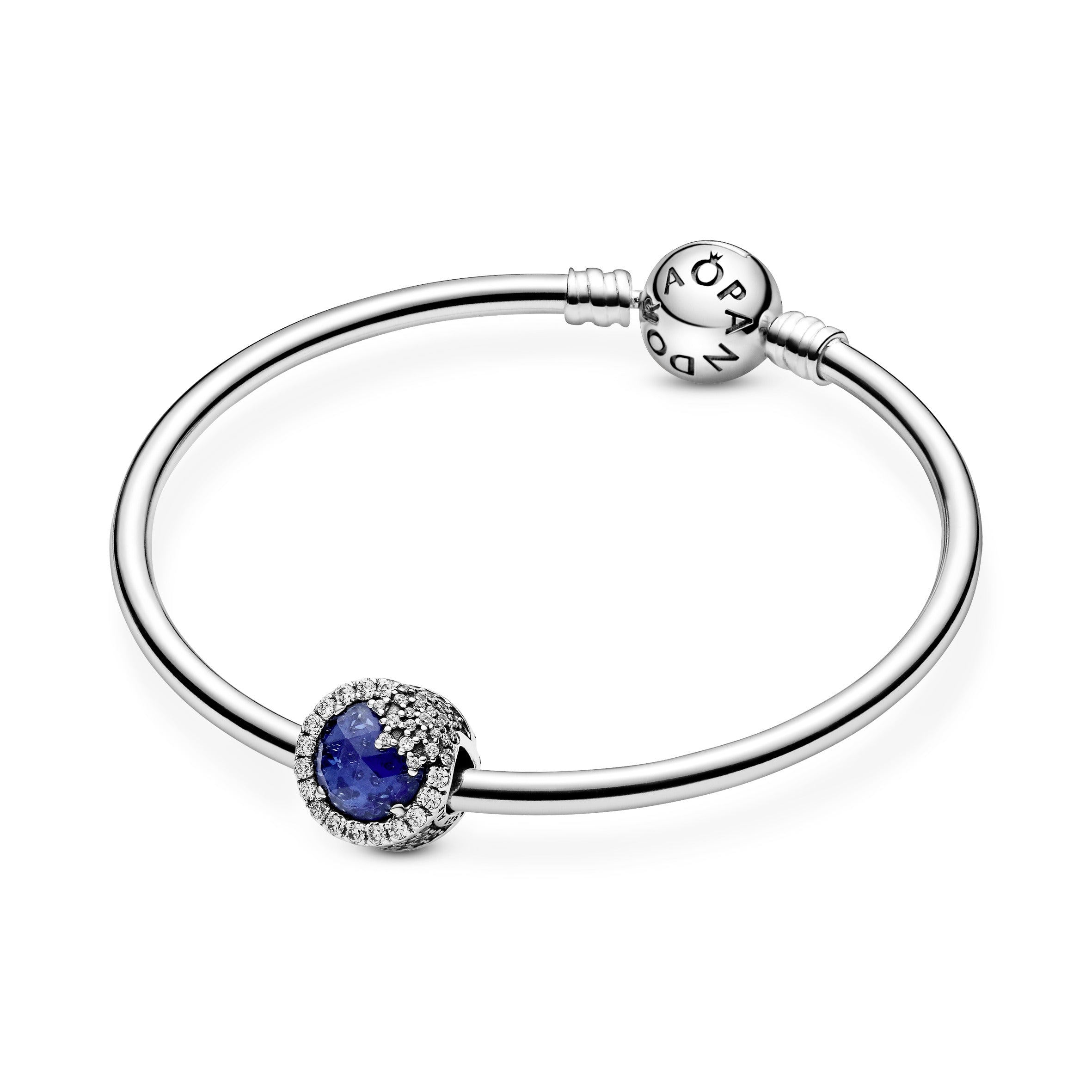 Snowflake silver charm with twilight blue crystal and clear cubic zirconia