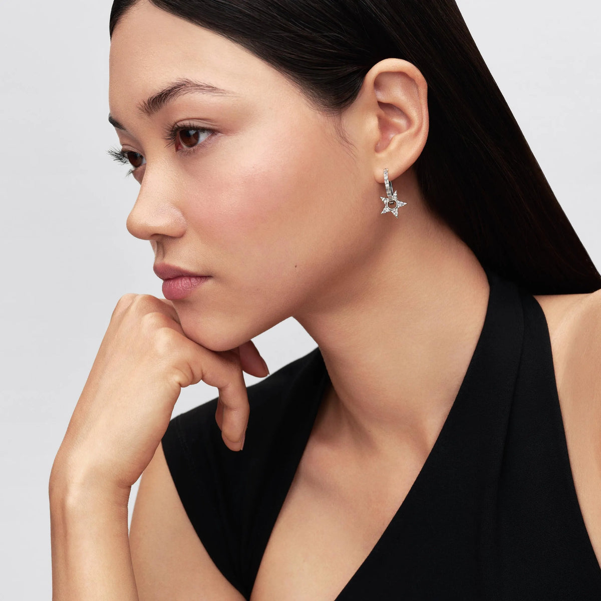 Star sterling silver hoop earrings with clear cubic zirconia