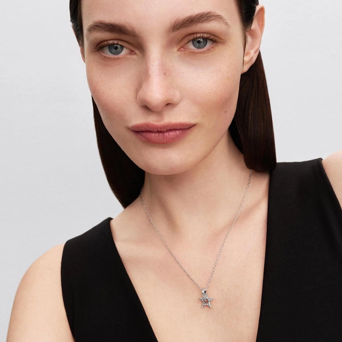 Star sterling silver pendant necklace with clear cubic zirconia