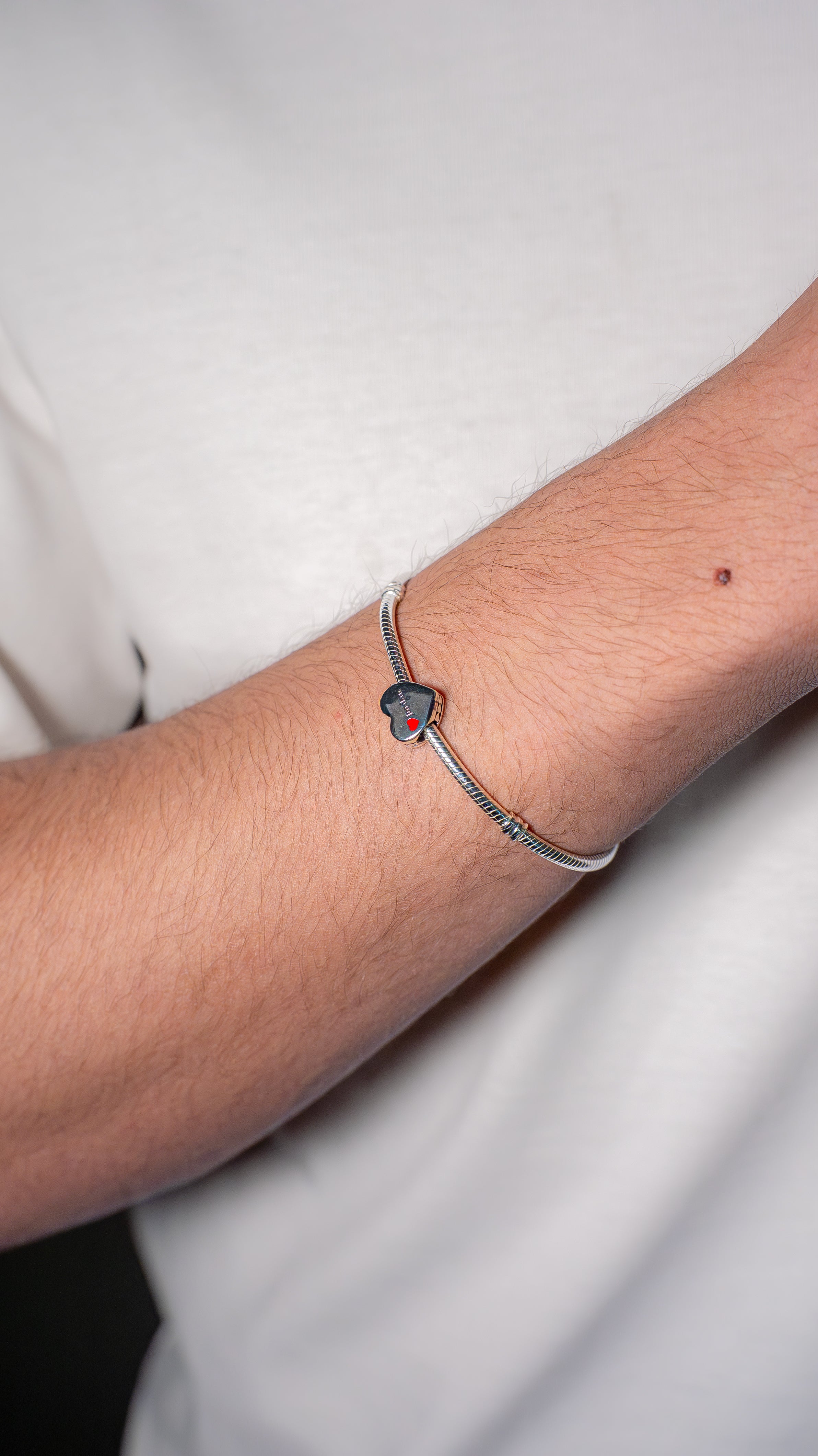 Jordan sterling silver charm with red enamel