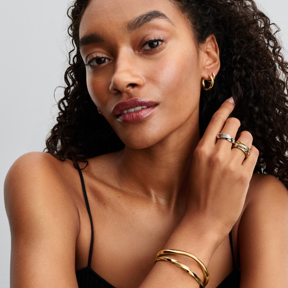 Twisted 14k gold-plated open bangle