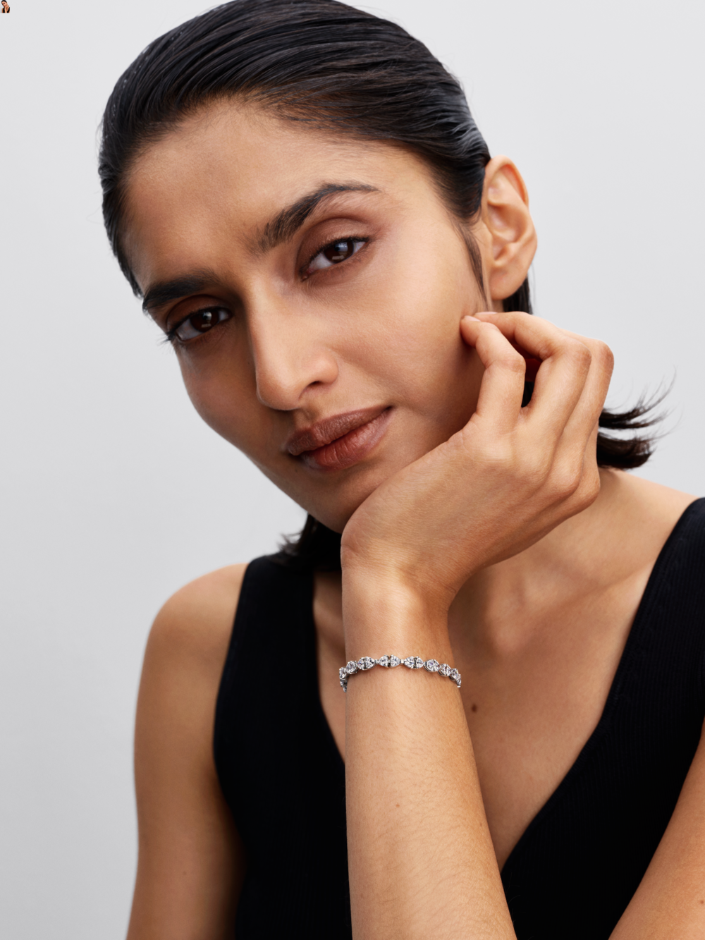Bow sterling silver bracelet with clear cubic zirconia