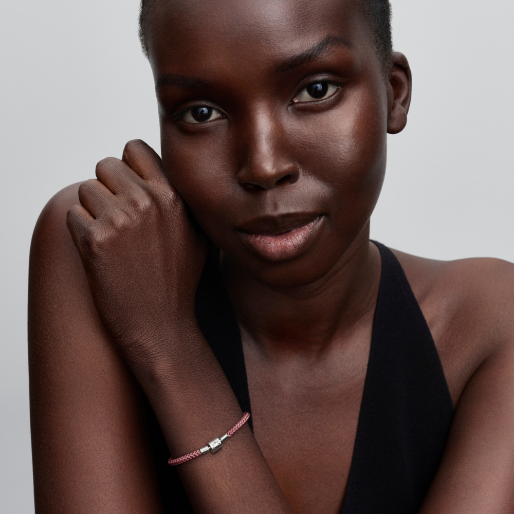 Sterling silver bracelet with shimmering pink cord