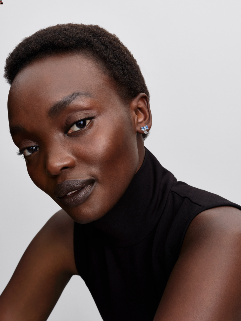 Bow sterling silver stud earrings with dream blue crystal and clear cubic zirconia