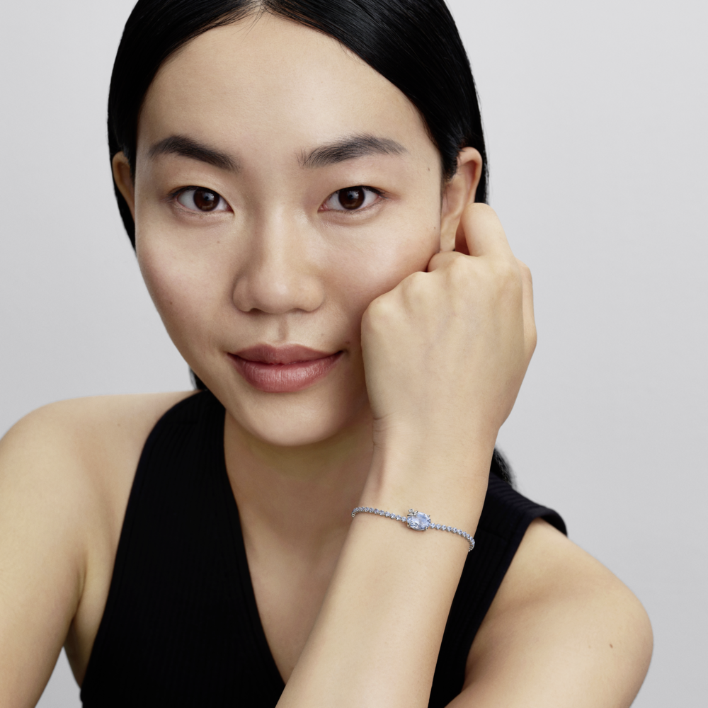 Bee sterling silver slider tennis bracelet with dream blue crystal and clear cubic zirconia