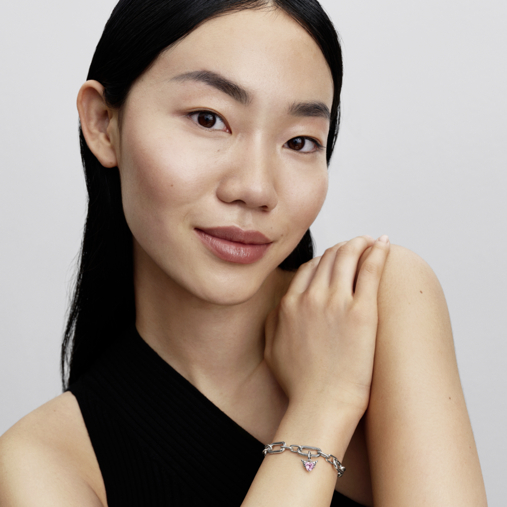 Winged heart sterling silver mini dangle with orchid pink crystal