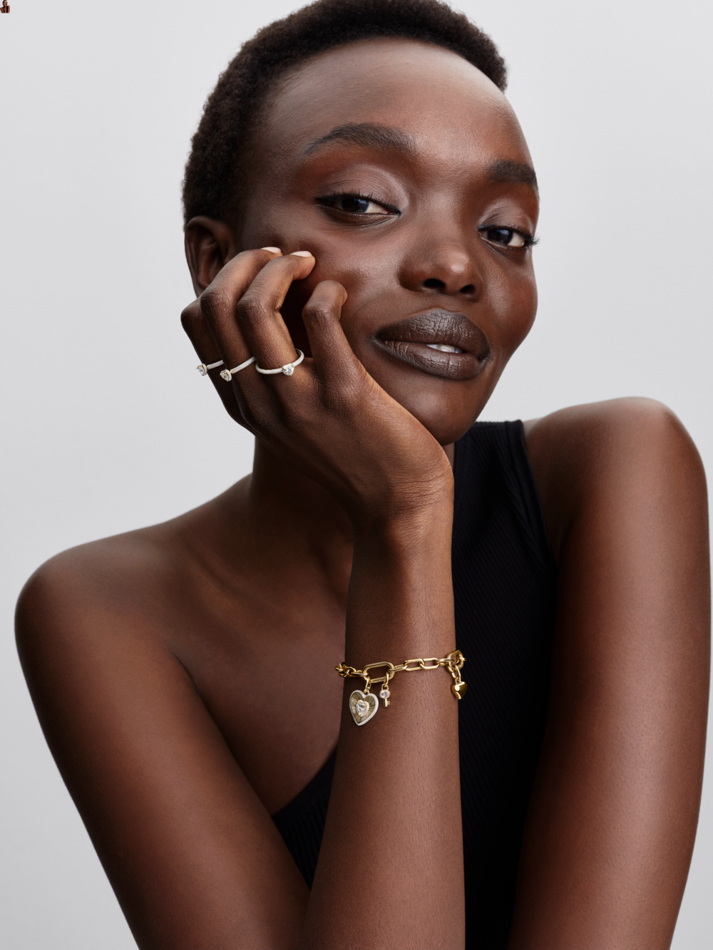 Heart 14k gold-plated medallion with clear cubic zirconia and shimmering white enamel