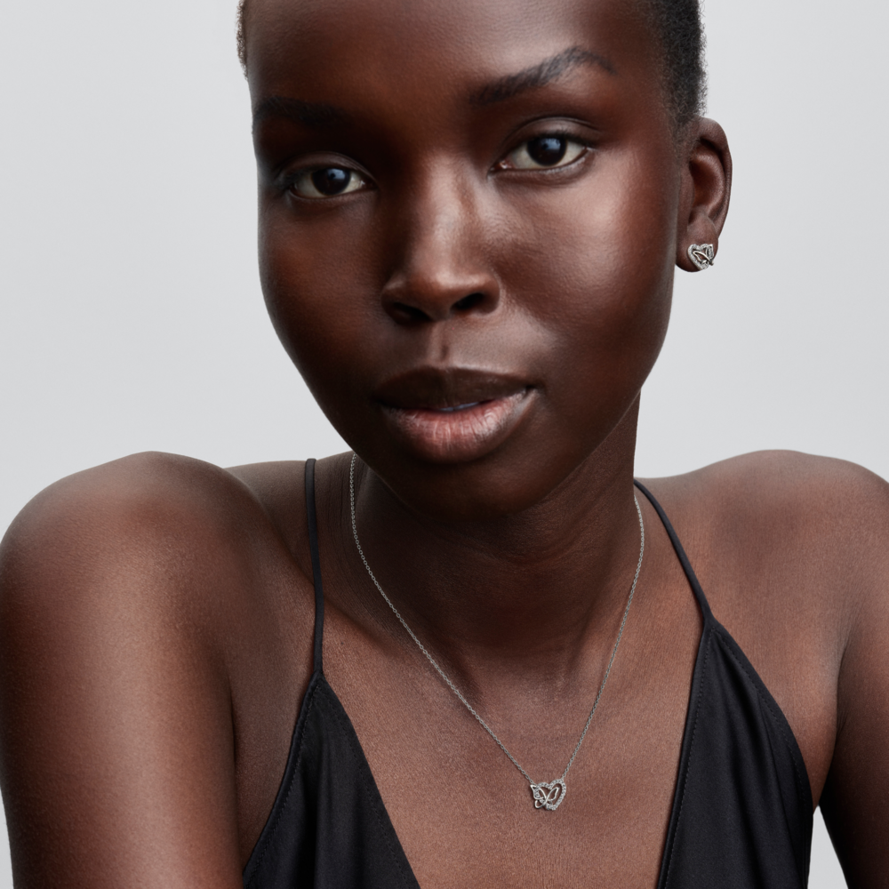 Heart and butterfly sterling silver stud earrings with clear cubic zirconia