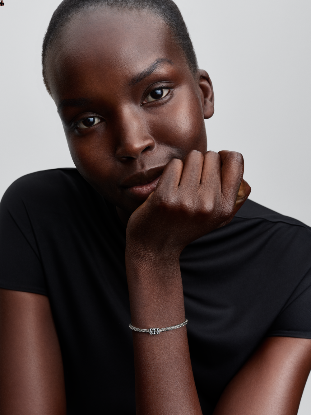 SIS sterling silver charm with clear cubic zirconia