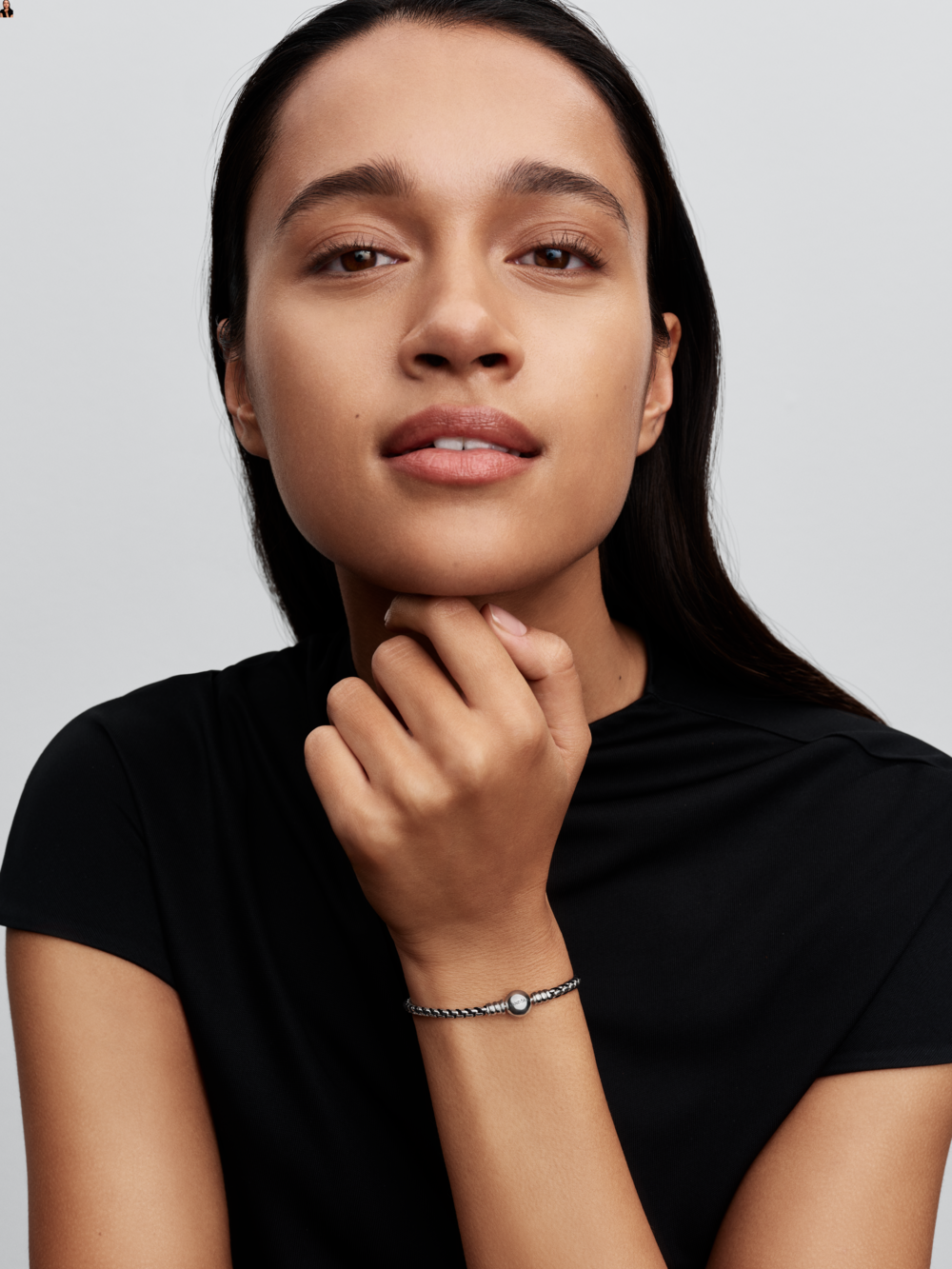 Braided sterling silver box chain bracelet with black textile cord
