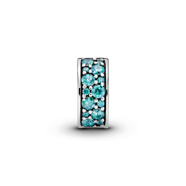 Silver clip with teal cubic zirconia, green crystal and bluish green crystal and silicone grip