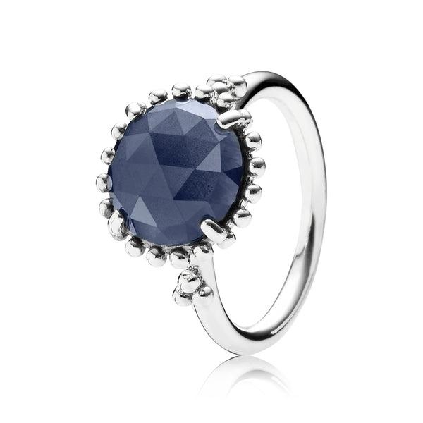 Silver ring with midnight blue crystal