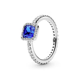 Silver ring with true blue crystal and clear cubic zirconia