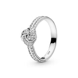 Love knot silver ring with clear cubic zirconia