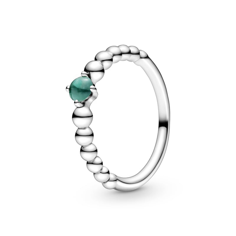 Sterling silver ring with treated rainforest green topaz