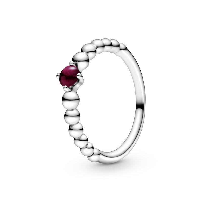 Sterling silver ring with treated dark red topaz