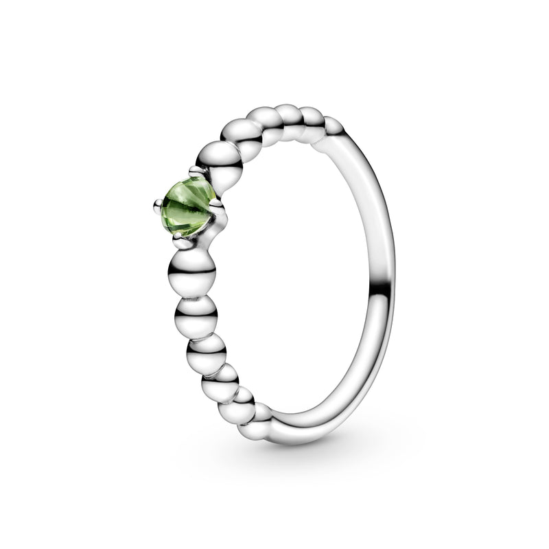 Sterling silver ring with treated spring green topaz
