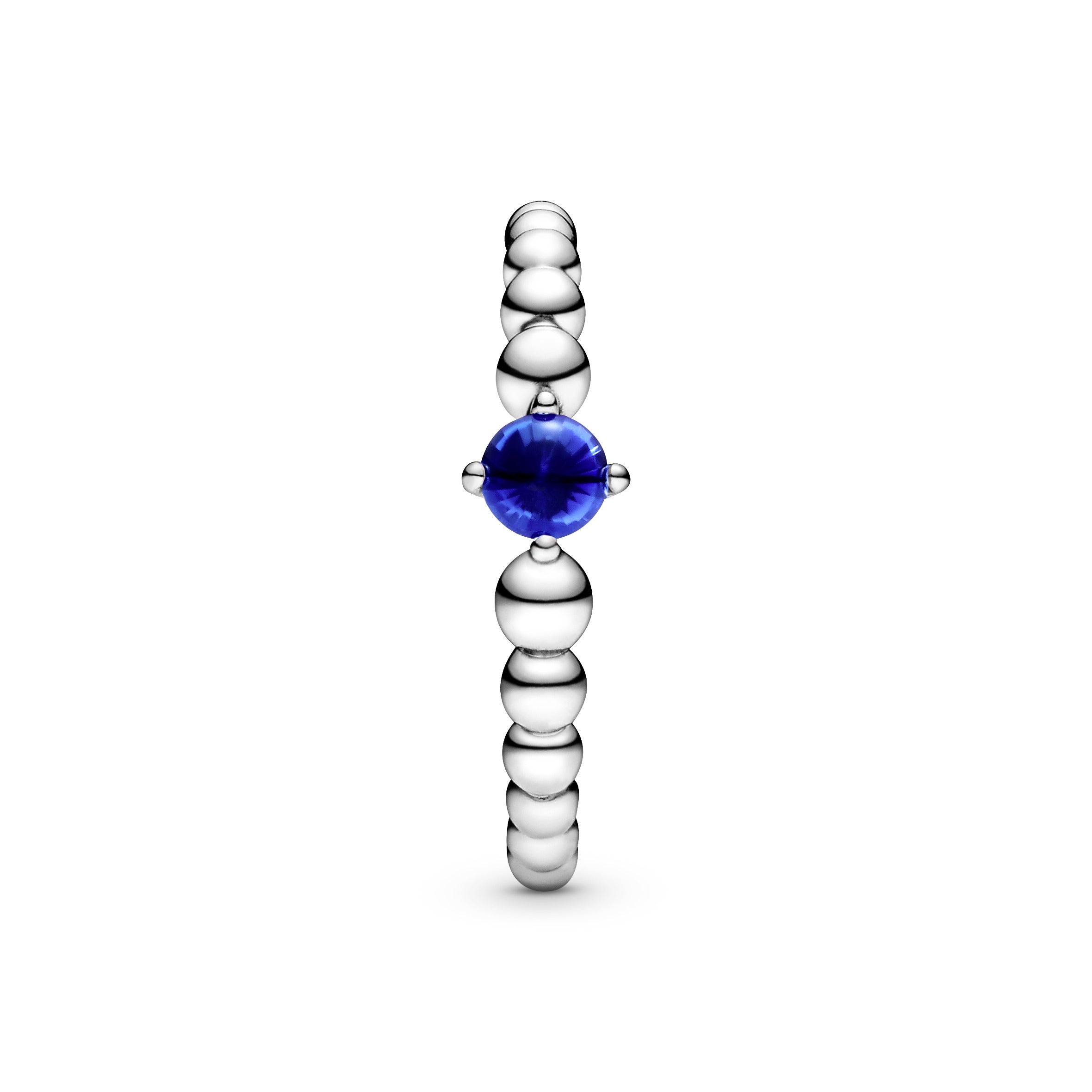 Sterling silver ring with treated sea blue topaz