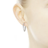 Hoop silver earrings with clear cubic zirconia
