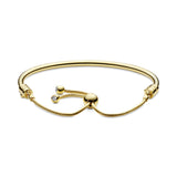 14k Gold Plated  bangle with clear cubic zirconia and sliding clasp
