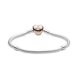 Silver bracelet with heart-shaped 14k Rose Gold-plated clasp