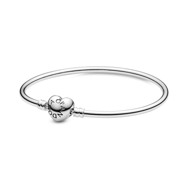 Silver bangle with heart-shaped clasp