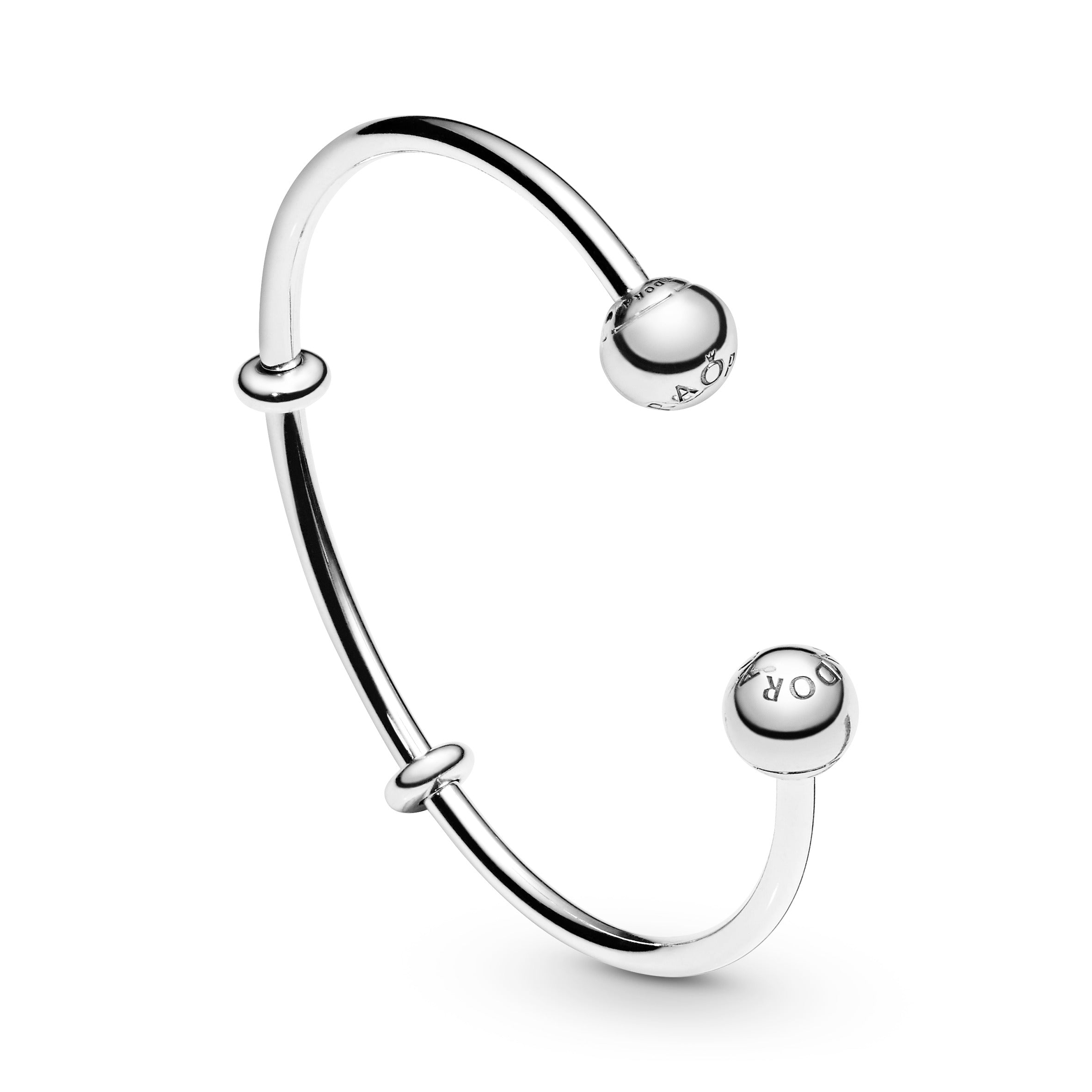 Silver open bangle with silicone stoppers and interchangeable end caps