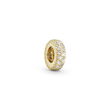 Abstract gold spacer with cubic zirconia