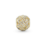 Love knot charm in 14k with clear cubic zirconia