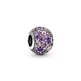 Pave silver charm with mixed shades of pink and purple cubic zirconia