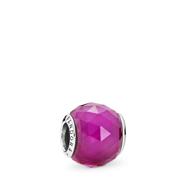 Abstract silver charm with faceted synthetic ruby