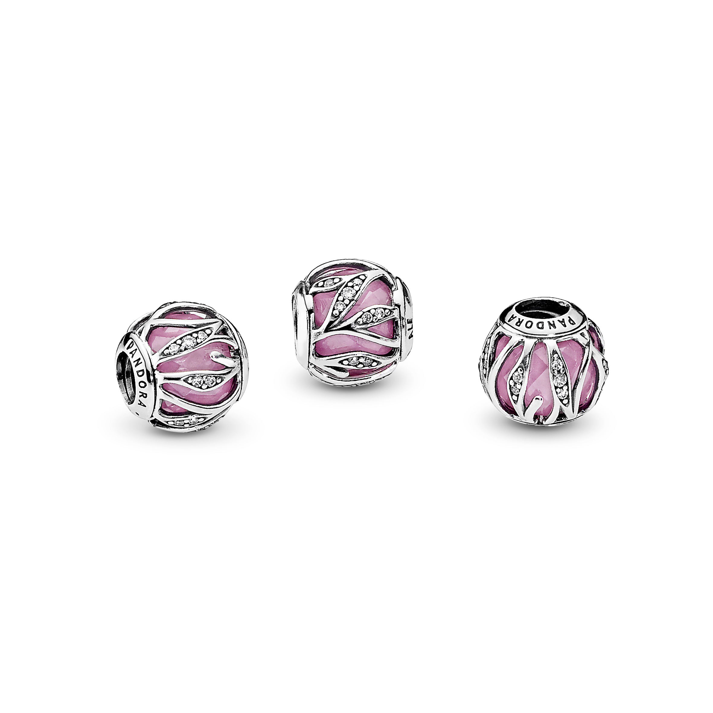 Abstract silver charm with faceted pink cubic zirconia and clear cubic zirconia