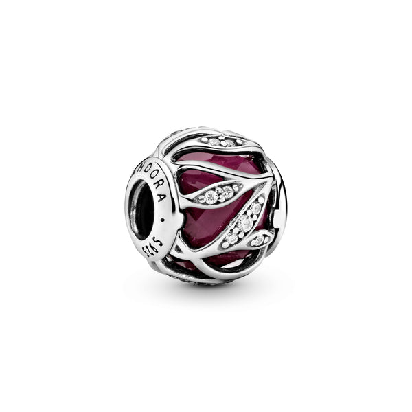 Abstract silver charm with faceted synthetic ruby and clear cubic zirconia