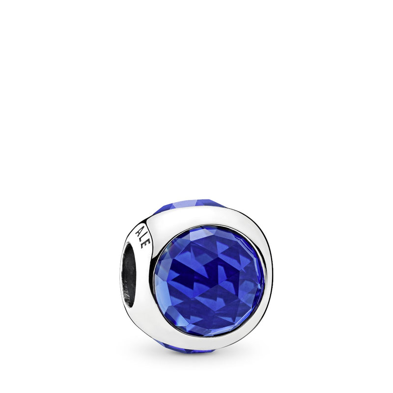Silver charm with royal blue crystal