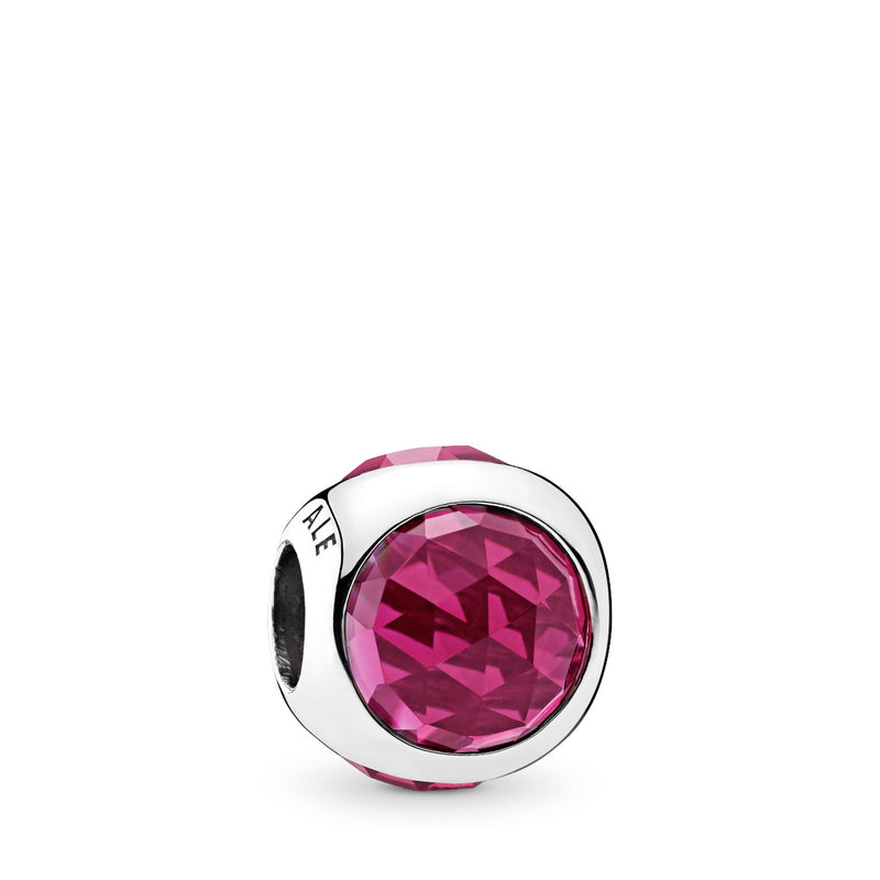Silver charm with cerise crystal