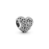 Openwork heart silver charm with clear cubic zirconia