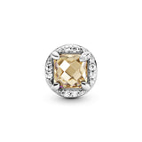 Seeds silver charm with golden coloured and clear cubic zirconia